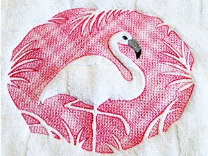 White flamingo embroidered on pink textured background with white palm leaves, on white fabric