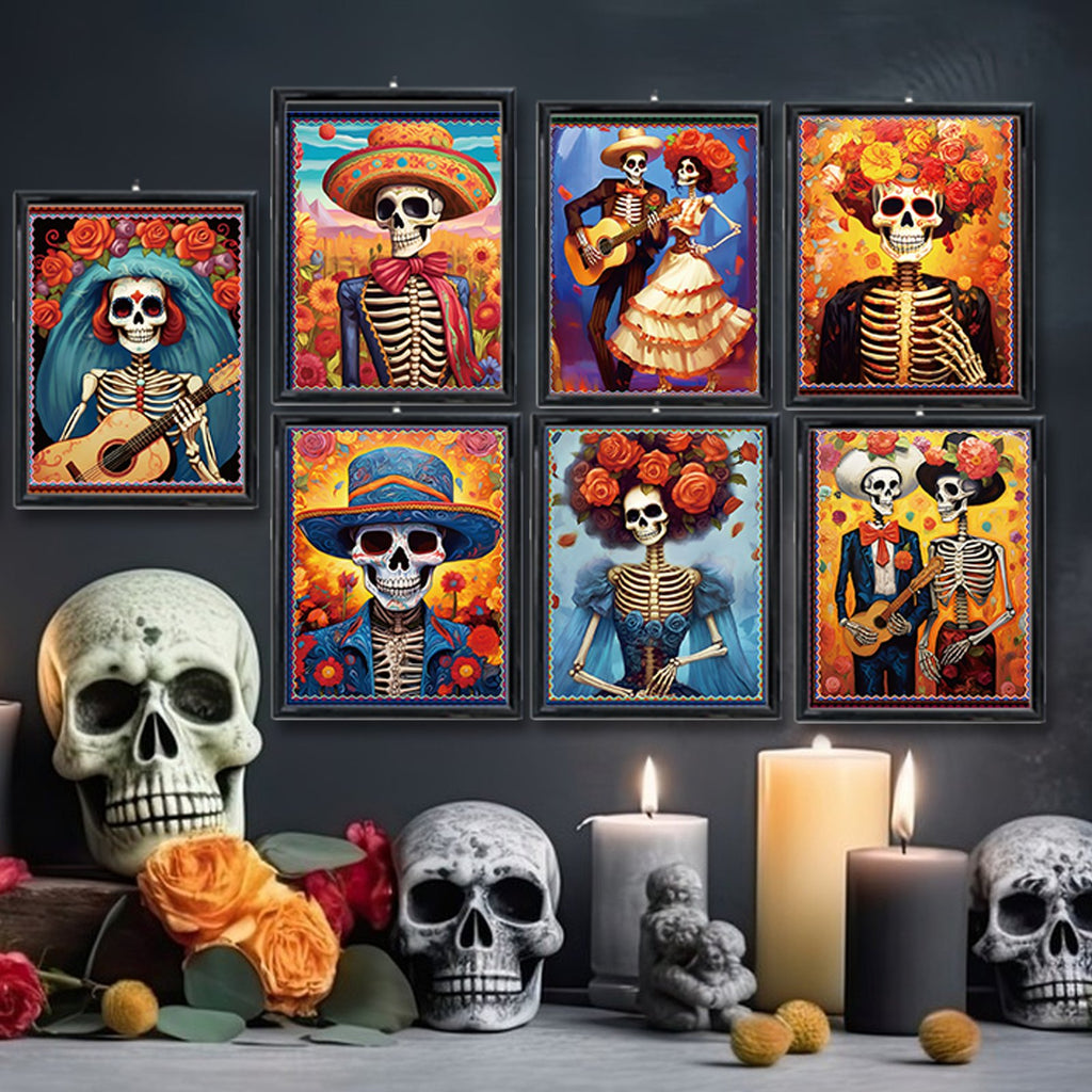 Day of the Dead sugar skull cutouts in frames, with skulls and candles in foreground