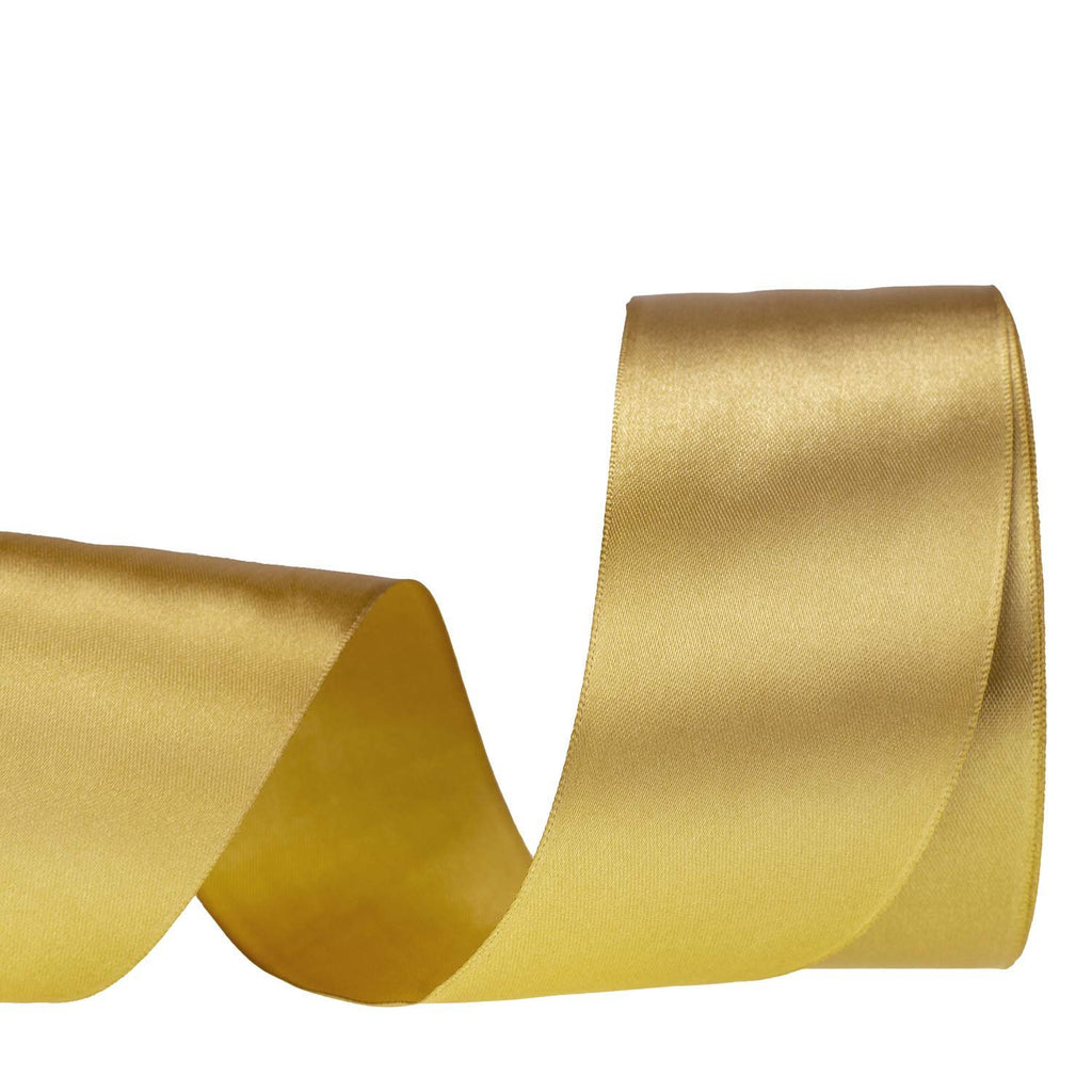 Dark gold satin ribbon curled on a white background