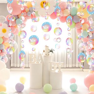 Transparent bubble garland with 80 PVC bubbles, arranged as a party decoration with balloons and a cake.