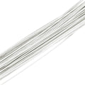 Bundle of 26 gauge white floral wire stems, paper-wrapped, on a white background.