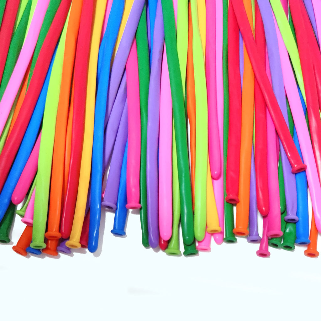 Assorted color twisting balloons for balloon animals, laid out in a dense pile against a white background.