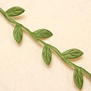 Olive green artificial leaf vine ribbon with small silk leaves attached to a thin stem, shown on a light background.