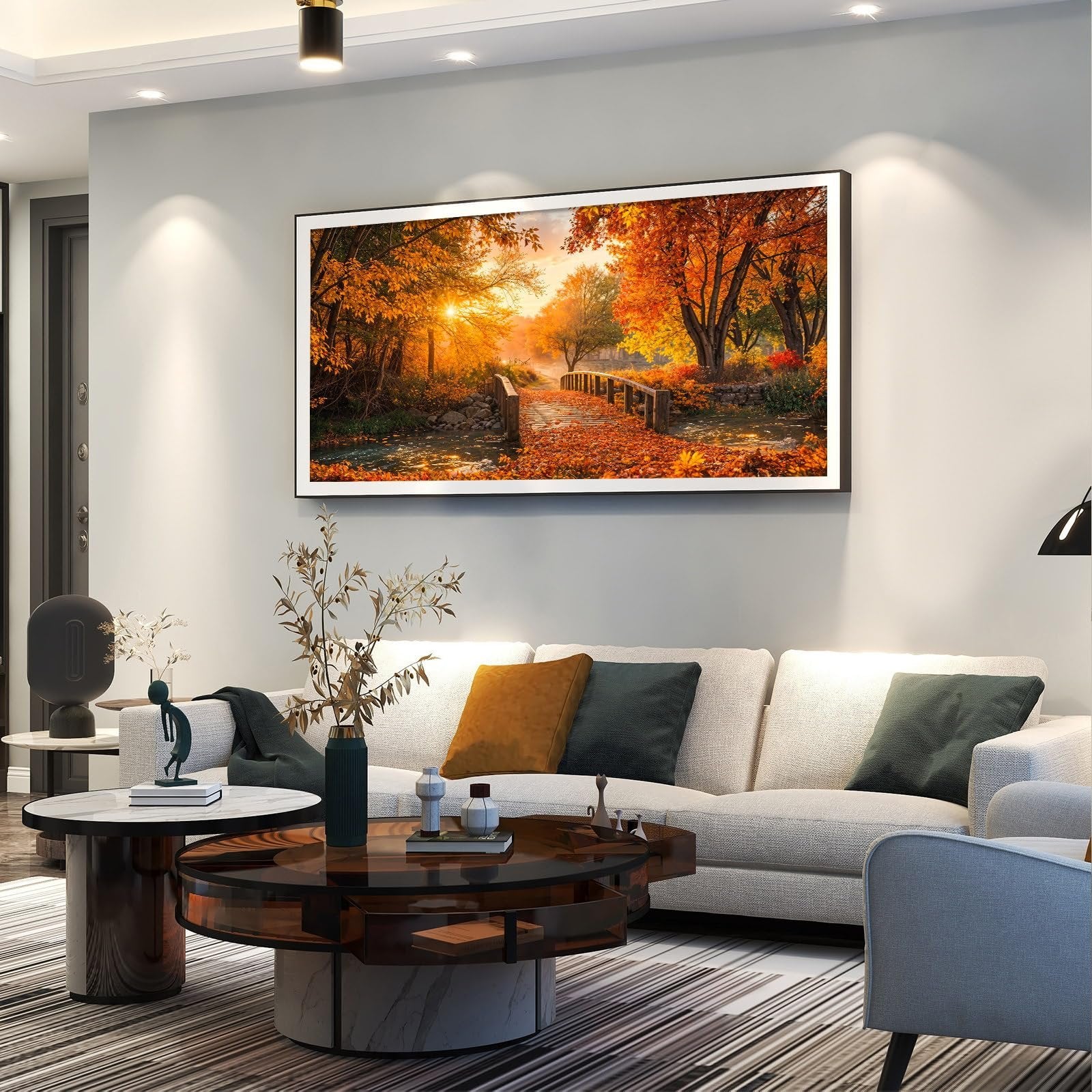 Forest sunset diamond painting kit artwork displayed above a sofa in a living room setting.