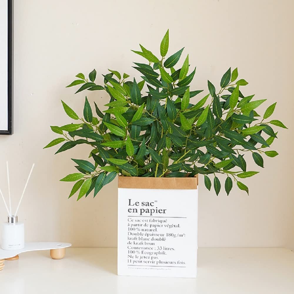 Artificial Italian Ruscus greenery stems in a decorative paper bag planter.