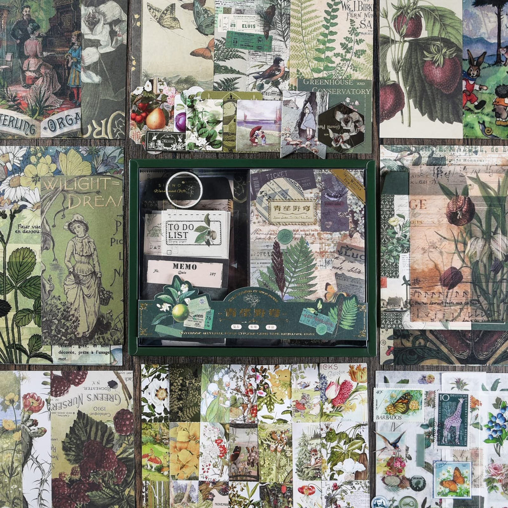 Scrapbooking kit contents including notebook, stickers, papers, and vintage ephemera, arranged in a grid layout.