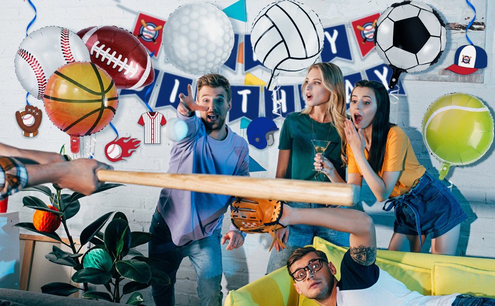 Group of friends celebrating with sports-themed foil balloons including baseball, basketball, soccer, and tennis designs.