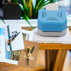 Blue and gray 3-in-1 paper corner rounder punch with R4mm, R7mm, R10mm labels, shown with craft cards.