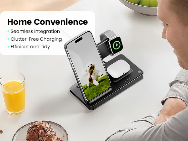 3-in-1 wireless charging station with phone, watch, and earbuds charging on a desk with a glass of juice and pastry.