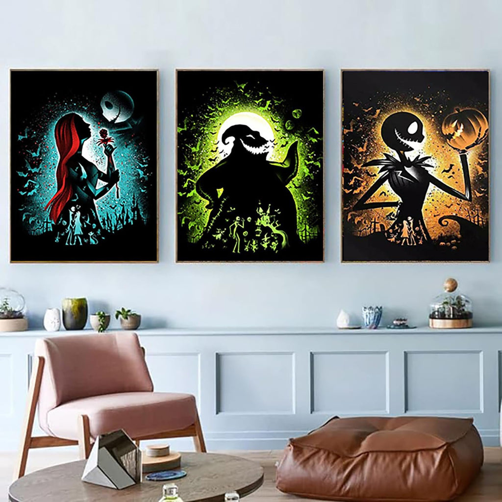 Three framed Halloween-themed diamond art paintings displayed on a wall above a chair and table.