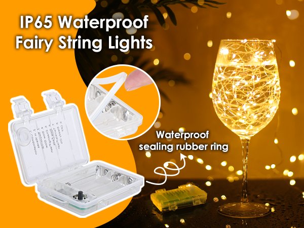 Warm white fairy string lights coiled inside a wine glass, with battery pack and case shown.