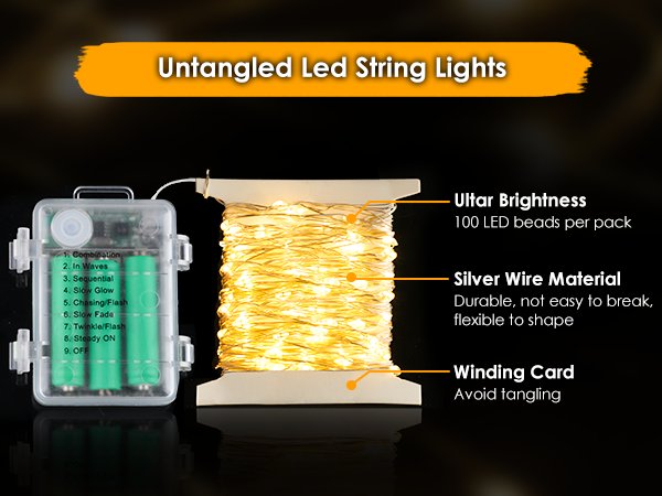 Warm white LED string lights on a spool with battery pack showing modes and features like brightness and material.