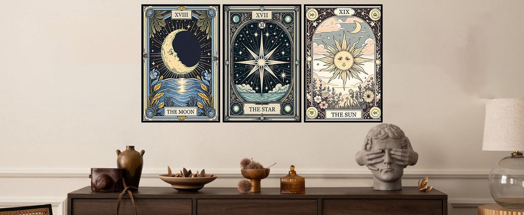 Three framed diamond painting kits depicting The Moon, The Star, and The Sun tarot cards, displayed on a wall above a dresser.