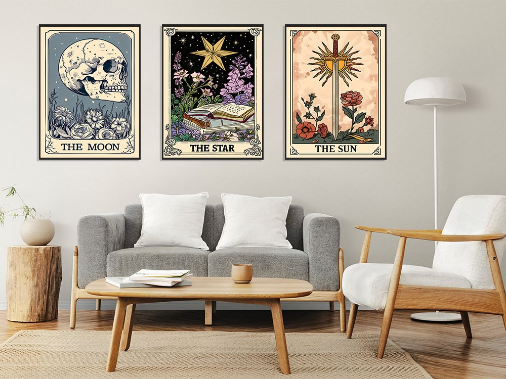 Three framed tarot-themed diamond art paintings hanging on a wall above a sofa.