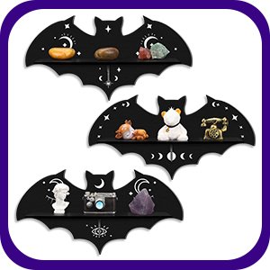 Three black wooden bat-shaped wall shelves with moon phase and star details, each displaying small decorative items.