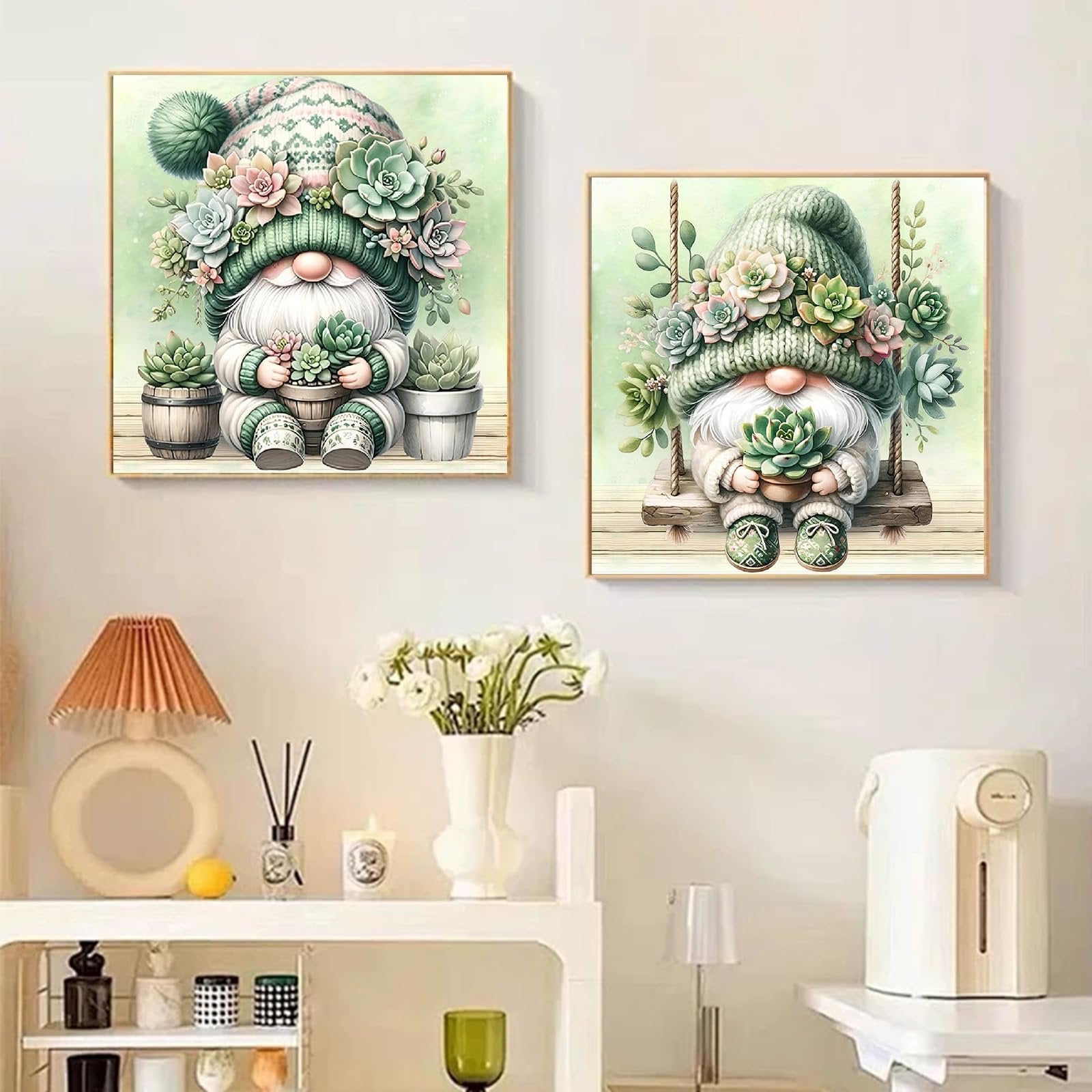 Two framed 5D diamond art paintings of gnomes holding succulents, one sitting and one on a swing.