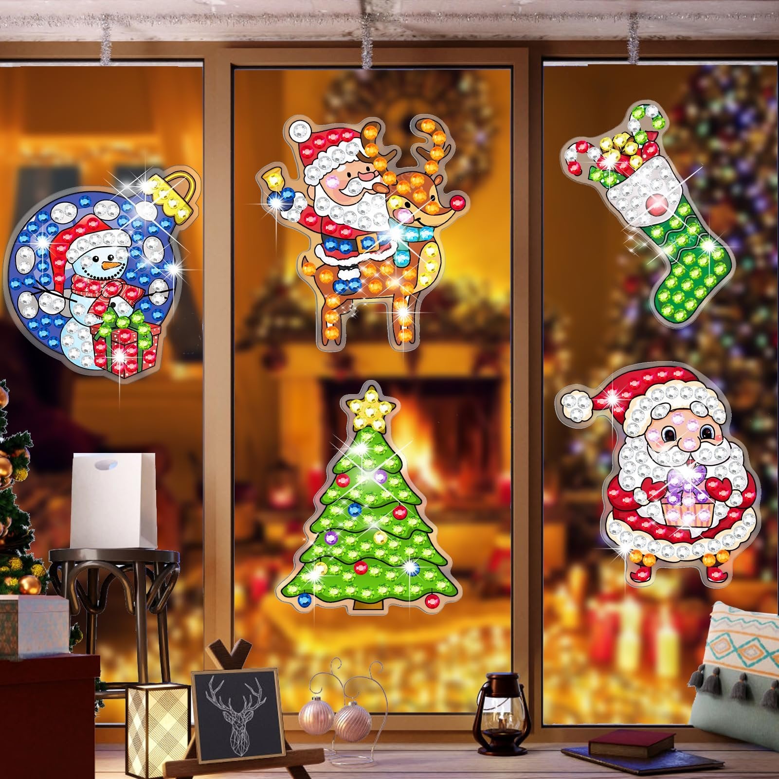 Diamond art Christmas window clings of Santa, reindeer, snowman, stocking, and tree displayed on a window.