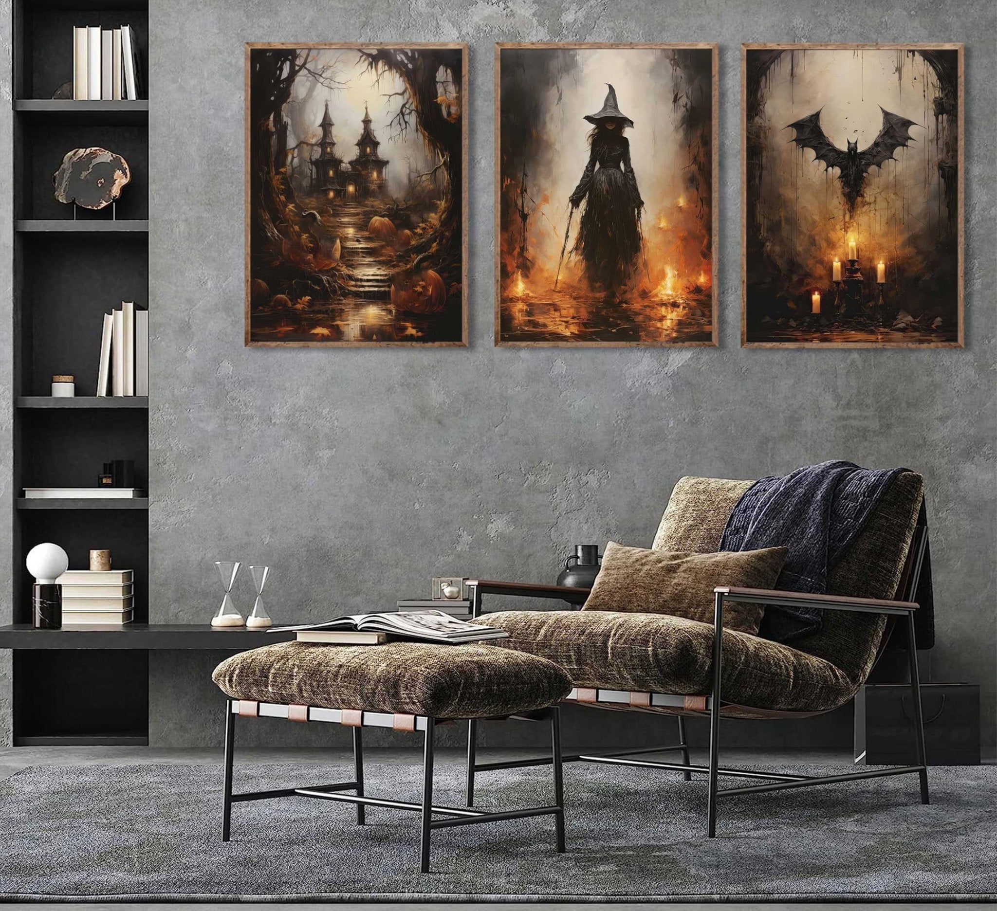 Three framed Halloween-themed canvas prints depicting a spooky castle, a witch, and a bat, displayed on a wall above a chair and ottoman.
