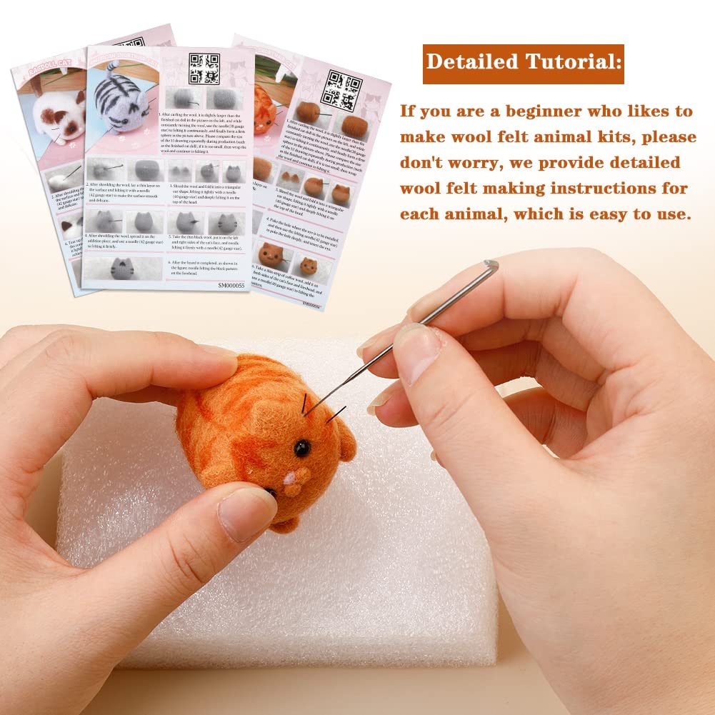 Hands needle felting an orange cat figure with a tool on a white foam pad, tutorial cards in background.