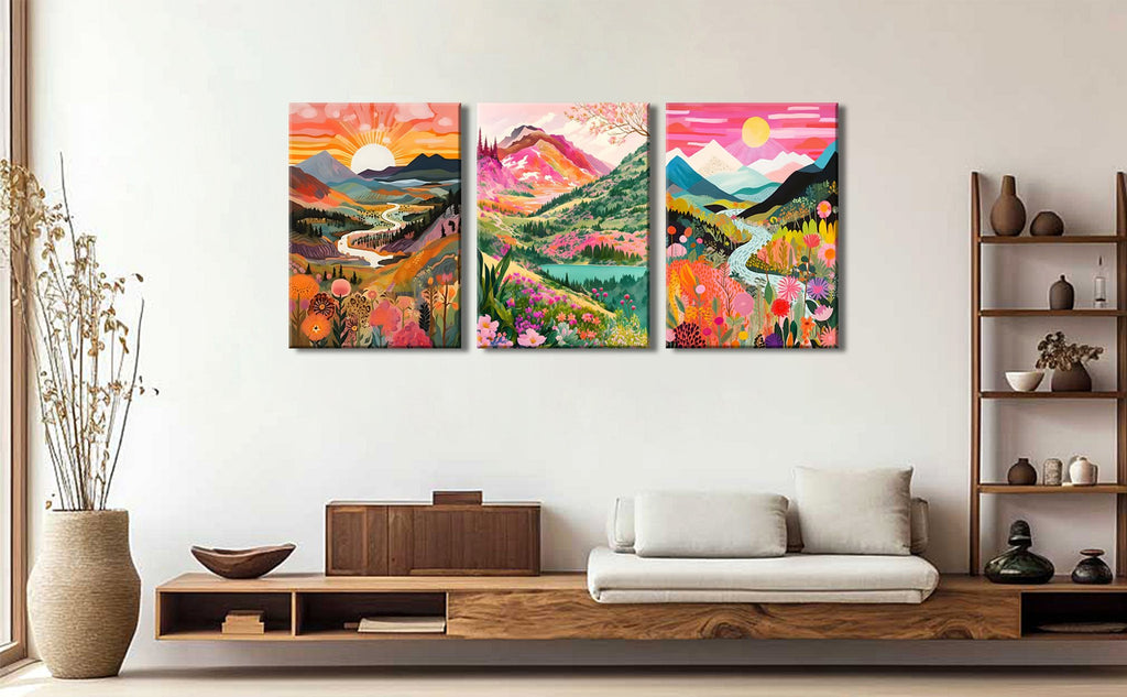 Three framed abstract landscape canvas wall art prints depicting colorful mountains, rivers, and flowers in a boho style.