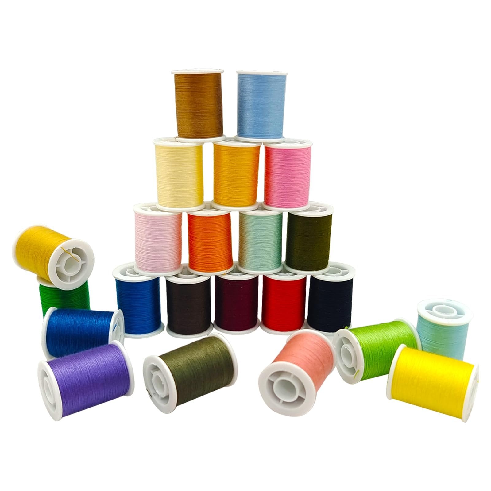 Assortment of colorful polyester sewing thread spools arranged in a pyramid and scattered, on a white background.