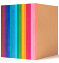 Stack of 30 A5 college ruled kraft notebooks with rainbow spines, shown from an angled perspective on a white background.