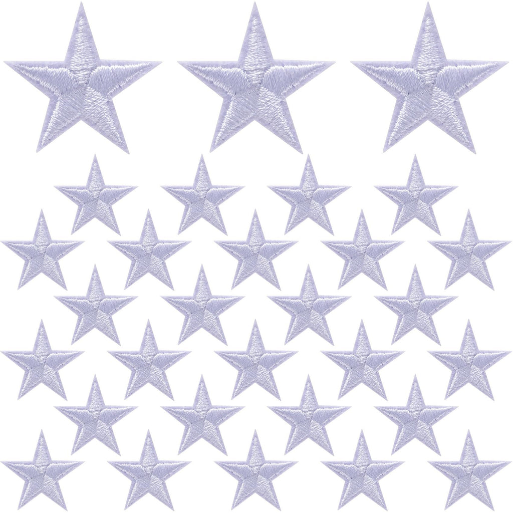 White embroidered star patches arranged in rows on a white background.