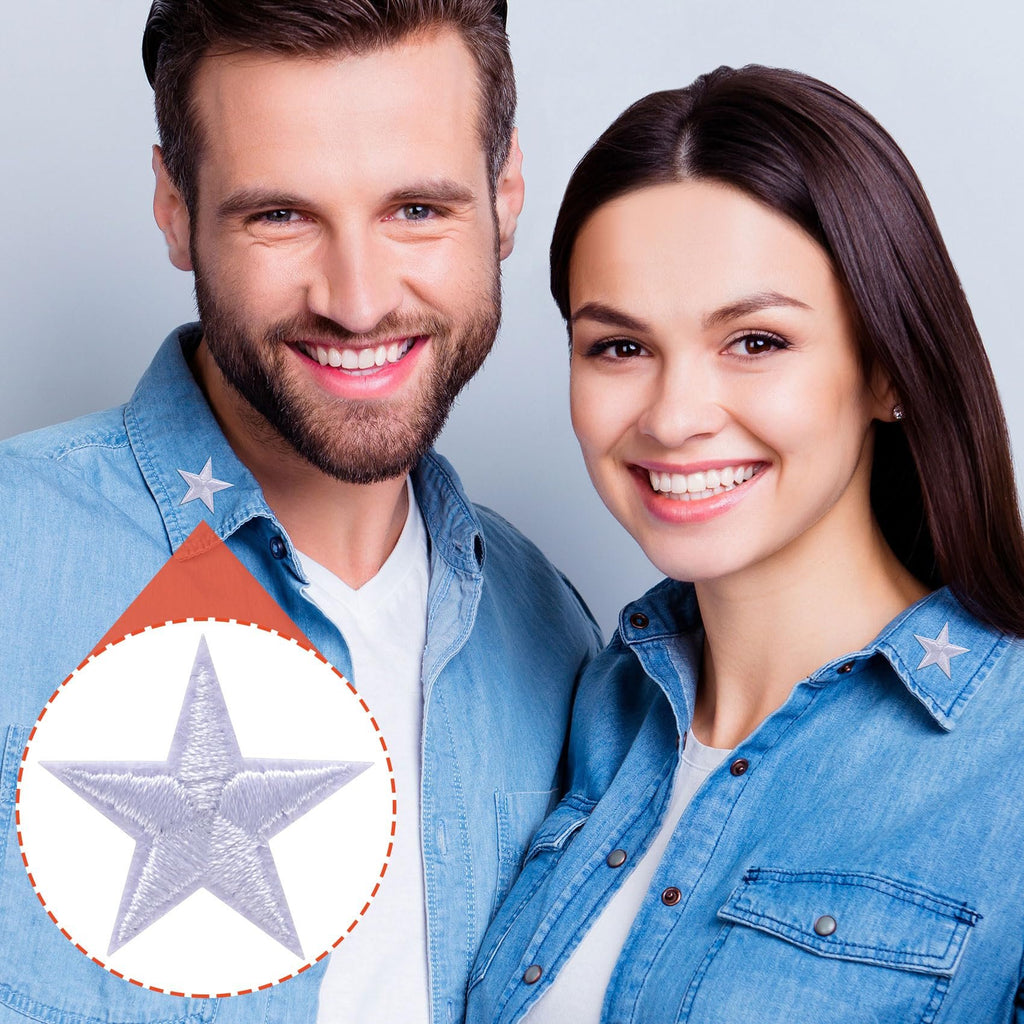 Couple wearing denim shirts with embroidered star patches on collars, close-up inset shows patch detail