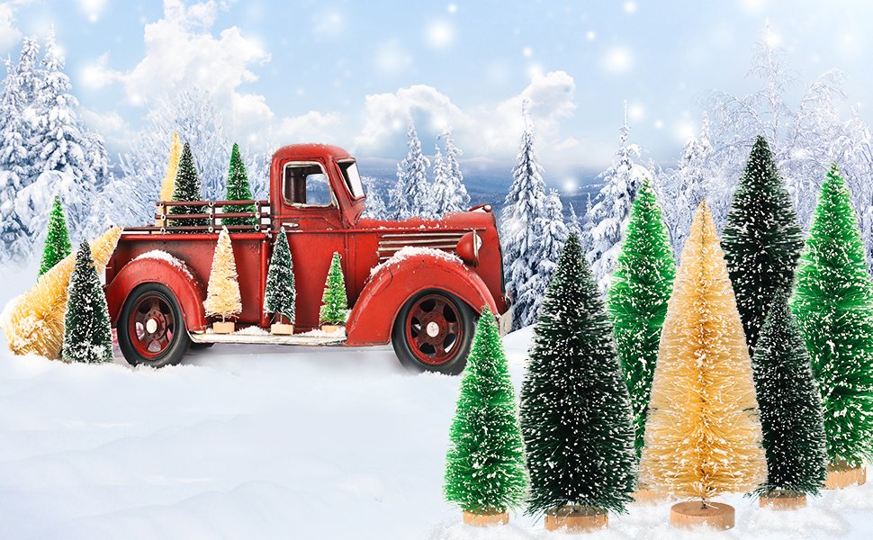 Red vintage truck loaded with mini snowy bottle brush Christmas trees in a winter forest scene