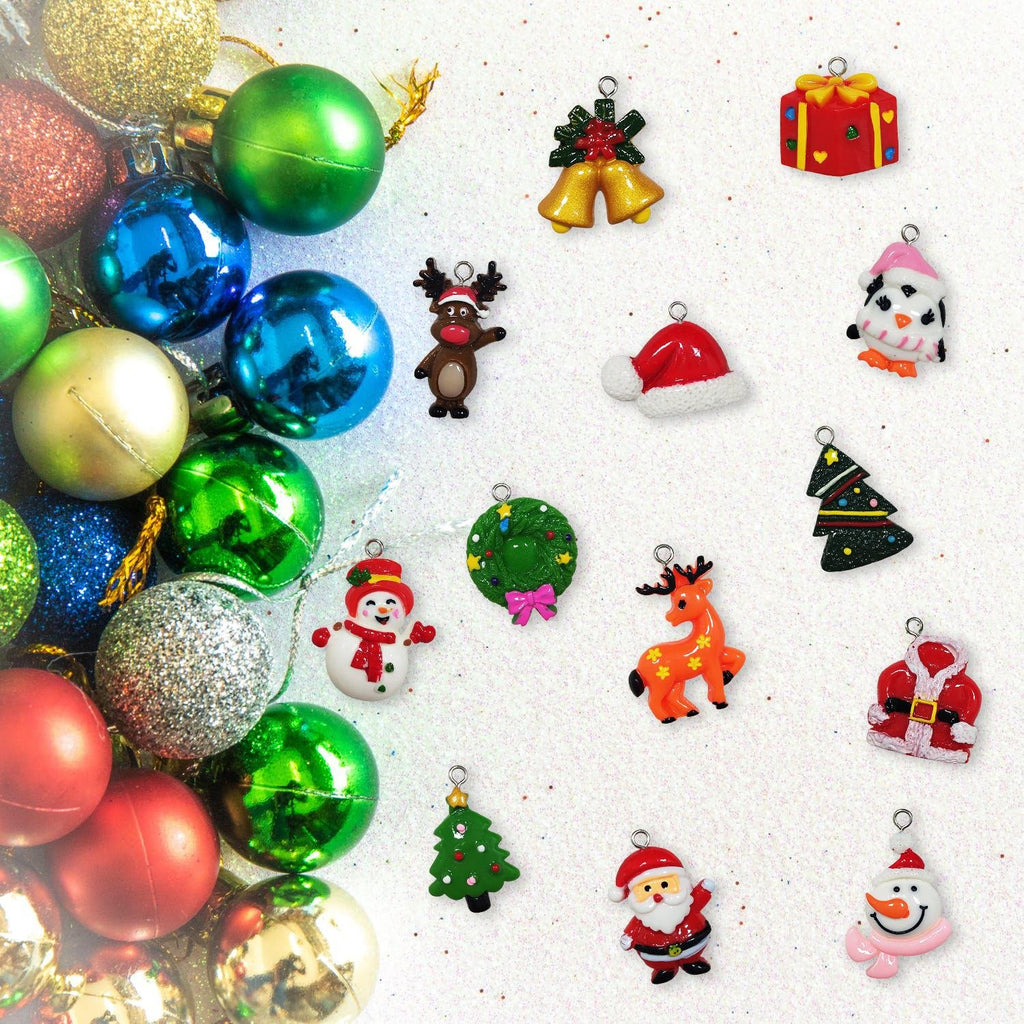 Assorted mini Christmas ornaments including Santa, snowman, reindeer, penguin, gift box, bells, and trees, arranged with larger Christmas baubles.