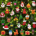 Collection of 30 assorted mini resin Christmas ornaments hanging on a decorated tree, featuring snowmen, Santa, reindeer, penguins, gifts, and stockings.
