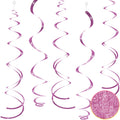 Five pink hanging swirl party decorations with glitter accents, shown against a white background. A close-up inset shows the glitter texture.