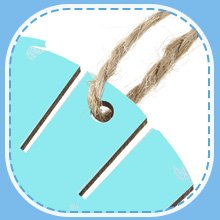 Close-up of a light blue wooden ocean animal ornament with twine hanger, showing striped texture and a small white pattern.