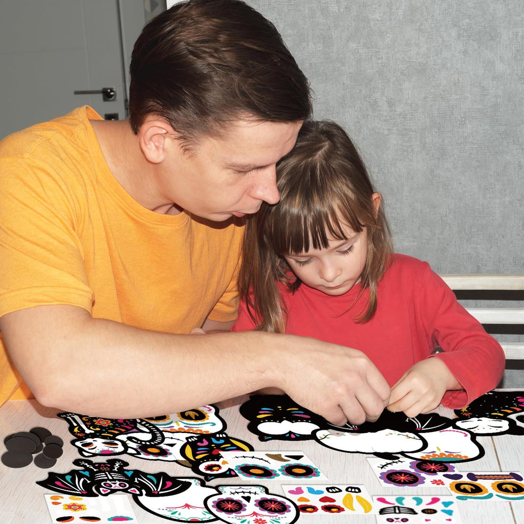 Father and daughter crafting Day of the Dead sugar skull magnets at a table