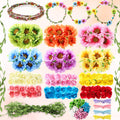 Flower crown making kit components including flower wreaths, assorted artificial flowers, greenery vines, and ribbon bows.