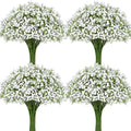 Four bunches of artificial baby's breath flowers with white blossoms and green stems, arranged in a grid on a white background.