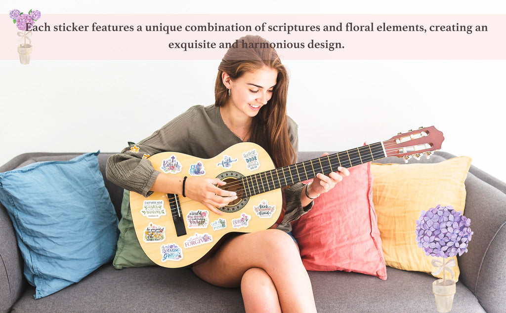 Young woman playing a guitar decorated with inspirational Christian stickers. She is sitting on a couch with pillows.