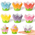 Collage of flower-shaped cupcake liners in various colors, including a decorated cupcake and a hand holding a liner.