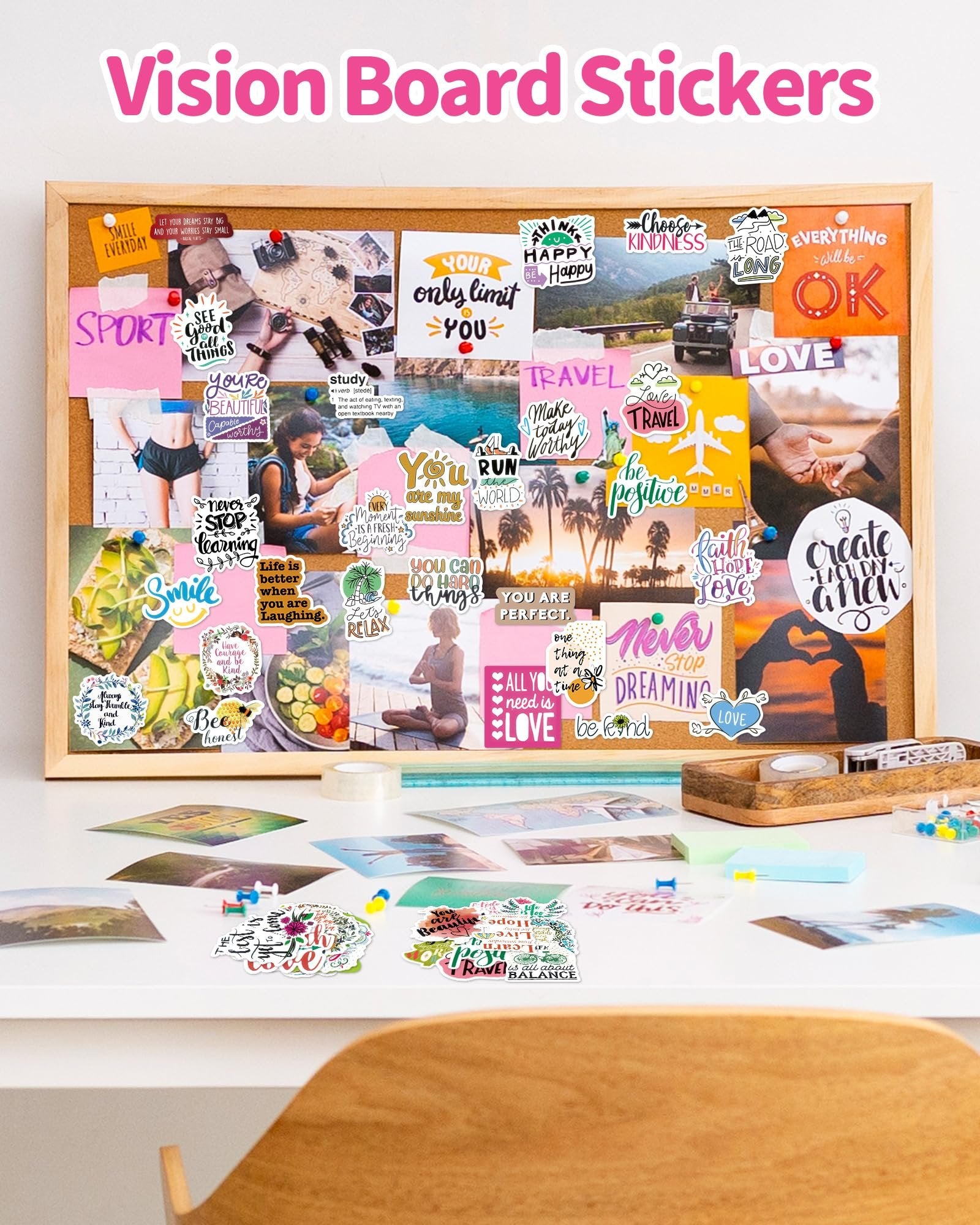 Vision board with inspirational stickers and photos, including quotes about dreams, travel, and positivity.