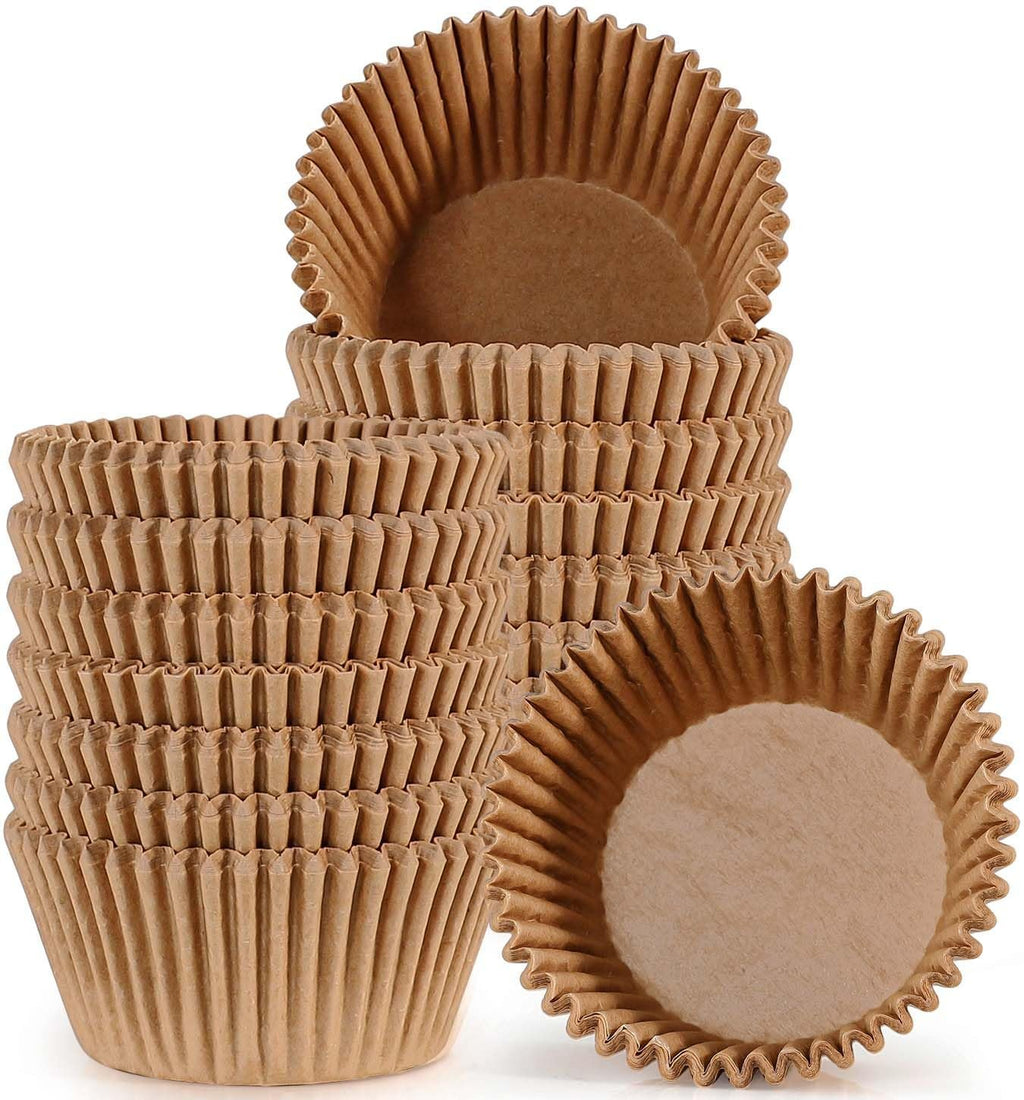 Stack of natural brown paper cupcake liners on a white background, close-up view