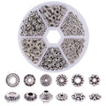 Set of antique silver metal spacer beads in a divided plastic container, with individual bead examples shown below.