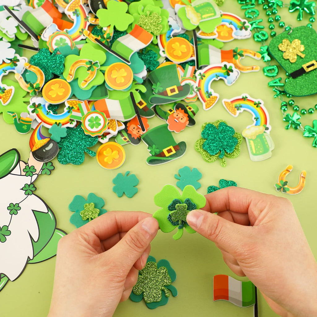 Hands holding St. Patrick's Day clover stickers, surrounded by various themed decals like shamrocks, rainbows, and leprechaun hats.