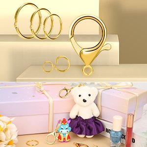Gold keychain making kit components including jump rings, lobster clasp, and small rings, with a teddy bear and gift boxes in the background.