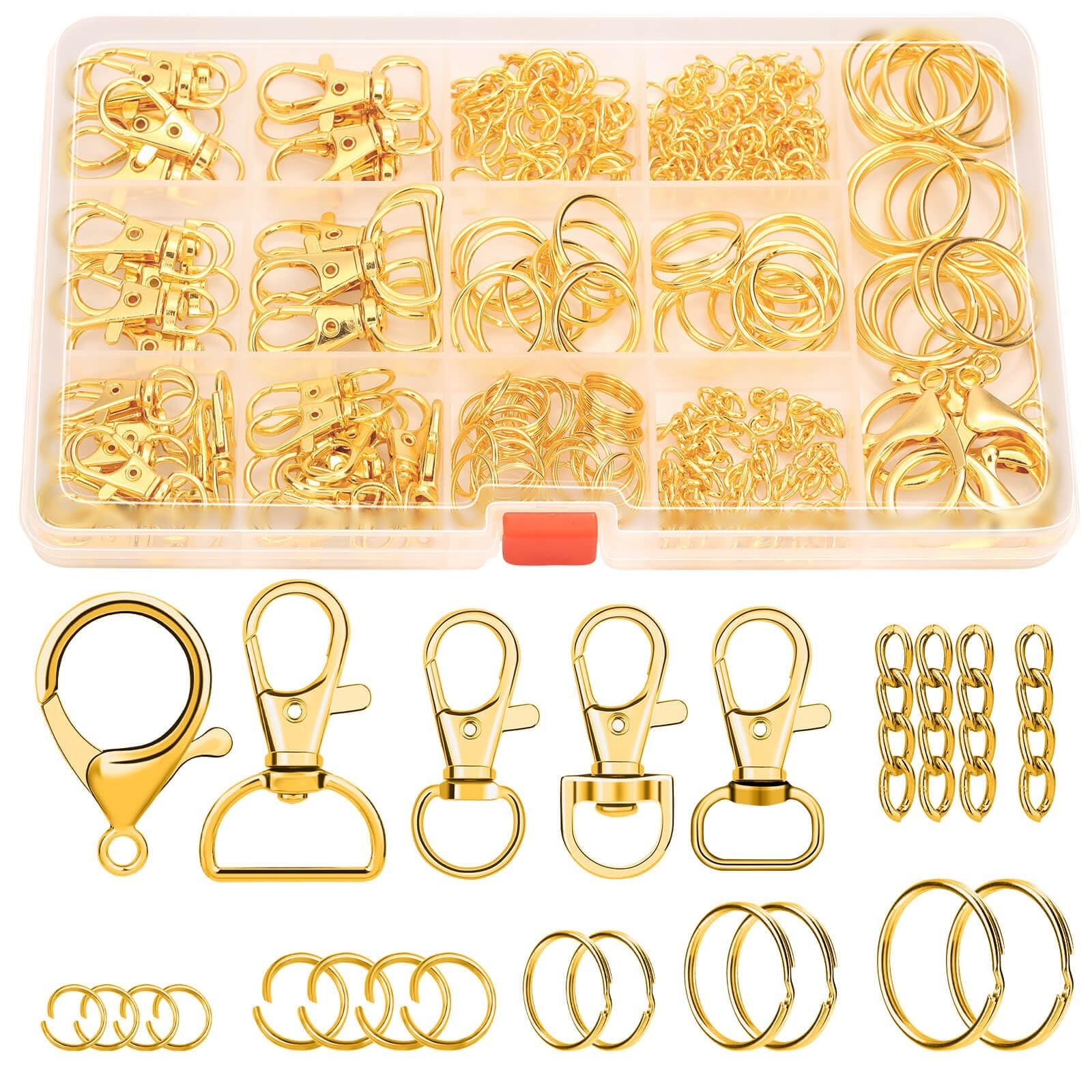 Gold keychain making kit components including clasps, rings, chains, and jump rings in a clear organizer box and laid out separately.