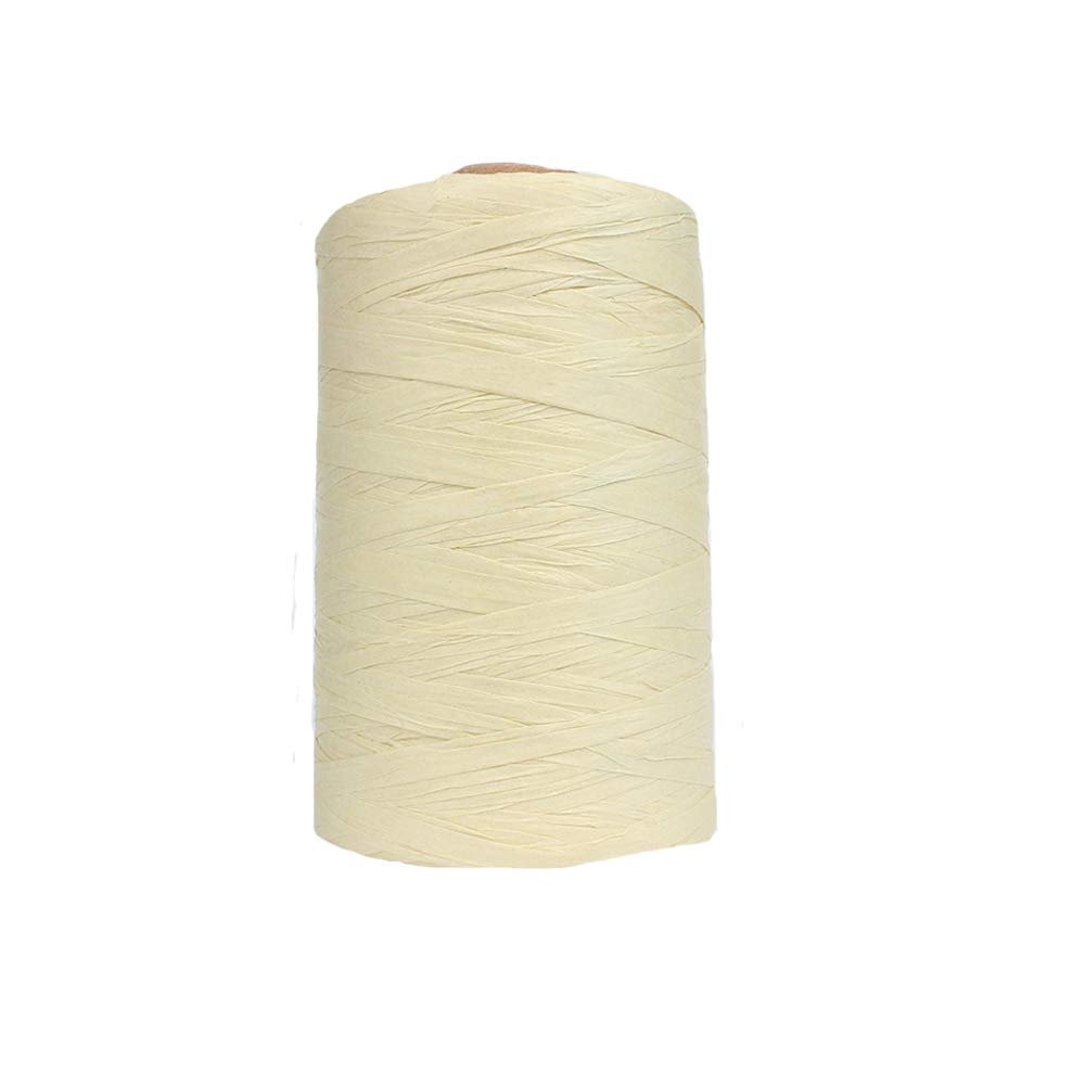 Spool of light yellow raffia paper yarn for crafting and DIY projects