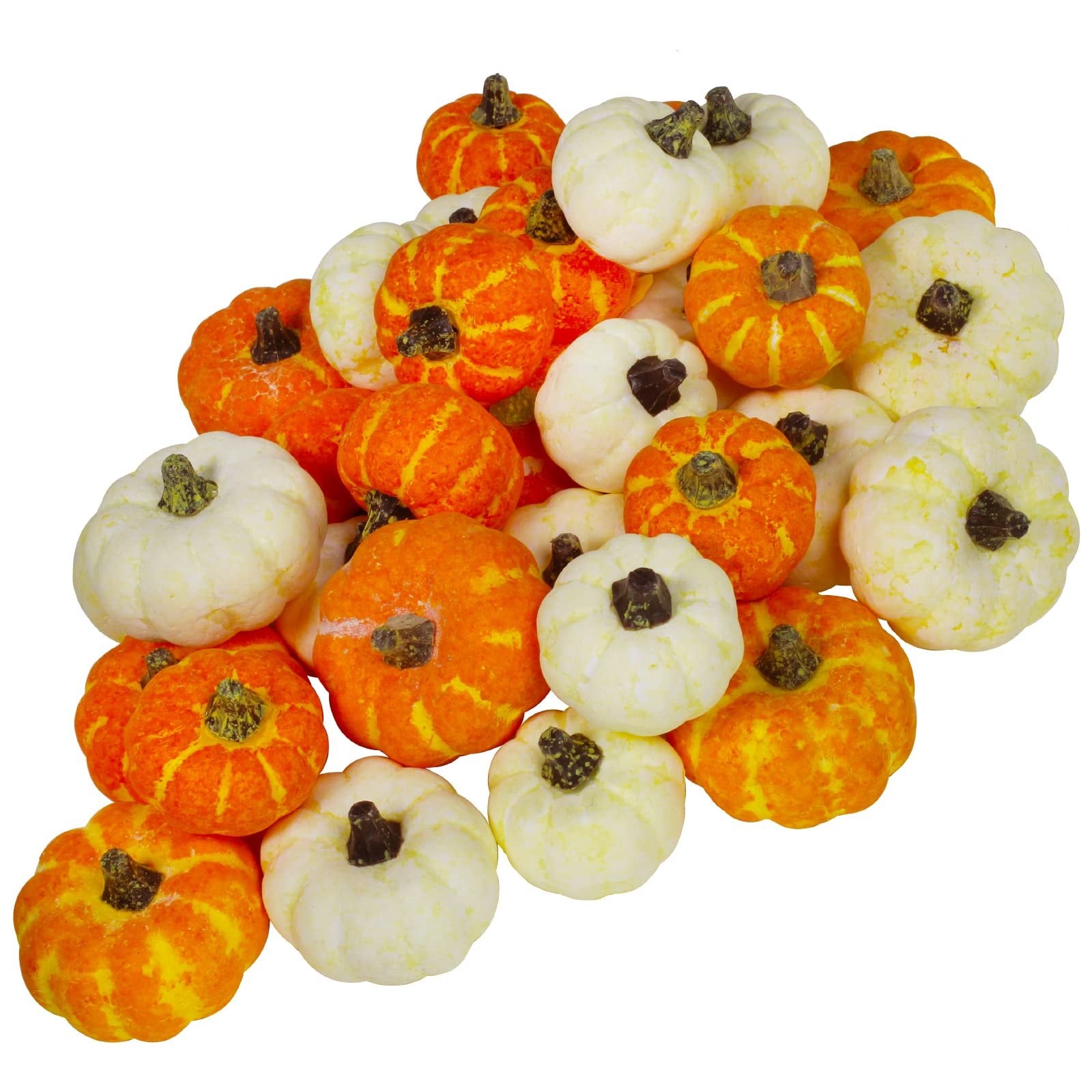 Assorted orange and cream mini pumpkins piled together, showing their textured surfaces and stems.