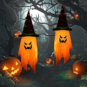 Two glowing witch hat ghost decorations hanging in a spooky forest setting with jack-o'-lanterns