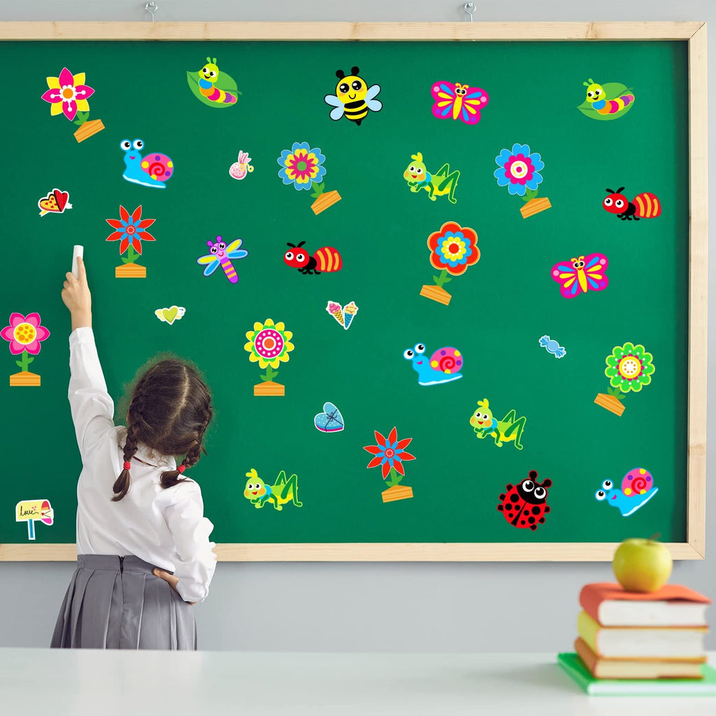 Girl writing on a chalkboard covered in colorful spring bug and flower craft stickers