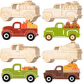 Collection of eight unfinished wooden truck and pumpkin cutouts in various styles and colors for DIY decorations.