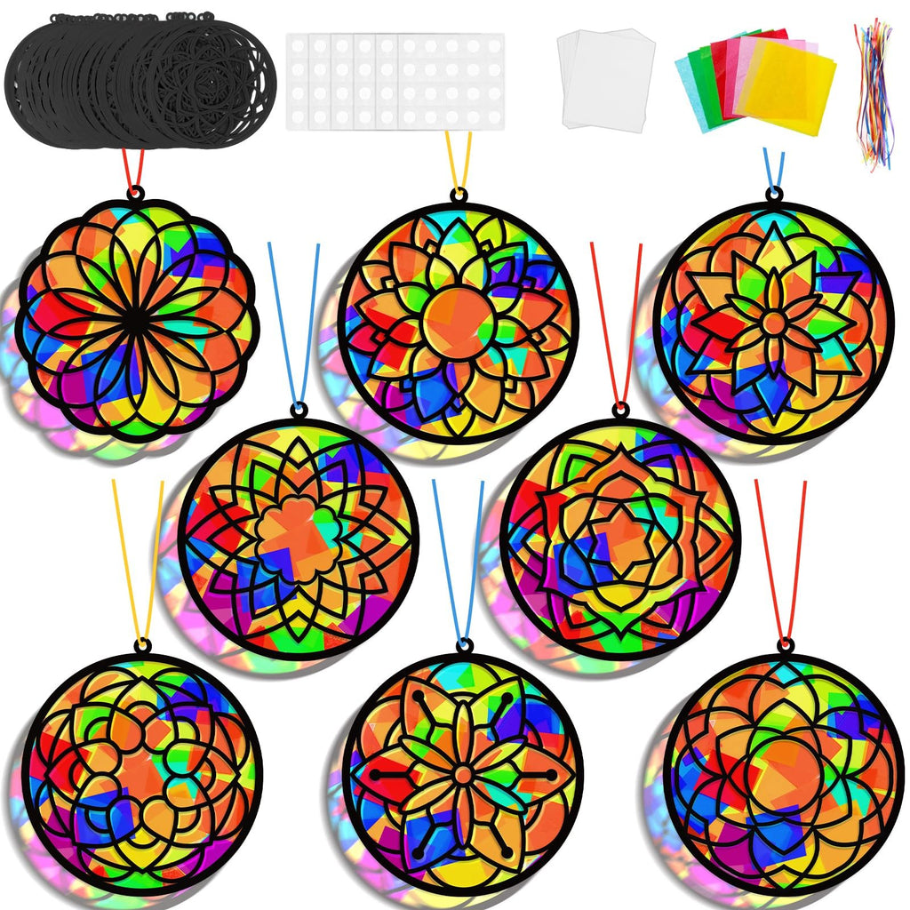 Craft kit with multiple colorful mandala flower suncatchers, black frames, and assorted craft supplies including paper, strings, and suction cups.